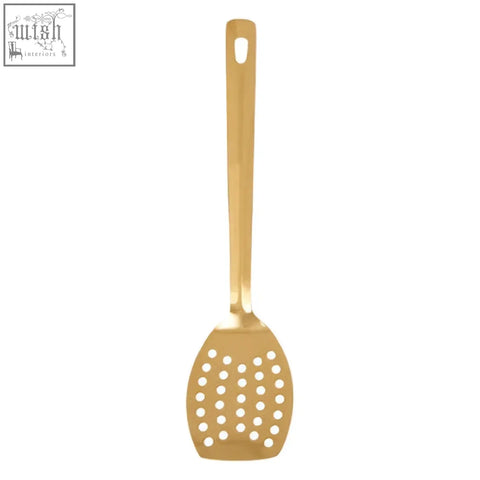 Freya gold finish slotted turner in gold stainless steel with sleek handle and evenly spaced circular slots