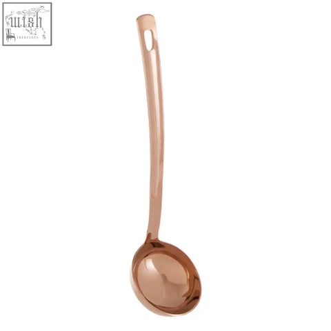 Freya rose gold finish ladle made of metal with a long handle and rounded bowl in rose gold color