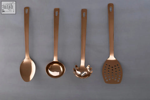 Set of four sleek copper-toned kitchen utensils with modern design and polished rose gold finish perfect for cooking