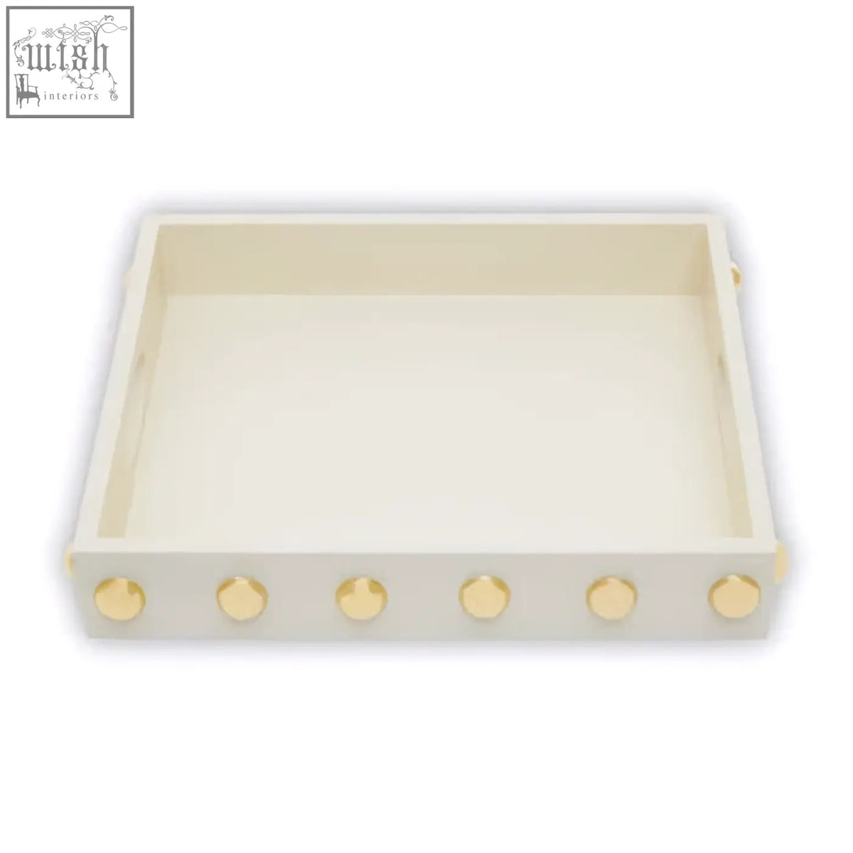 Cream-colored rectangular gold studded tray with gold-toned studs along the front edge for stylish decor