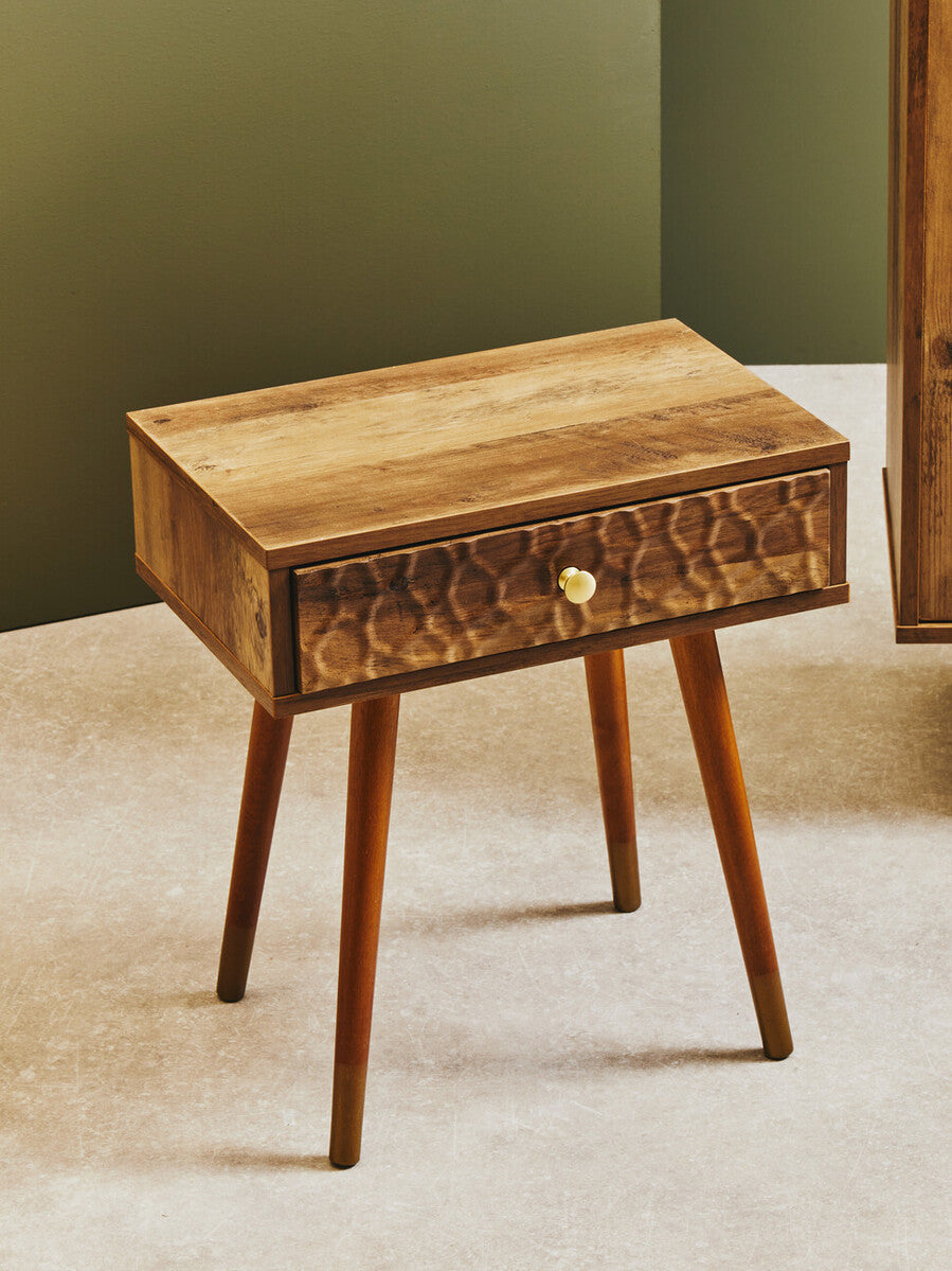 Rustic frida wood veneer bedside table with textured drawer front and tapered legs for stylish storage