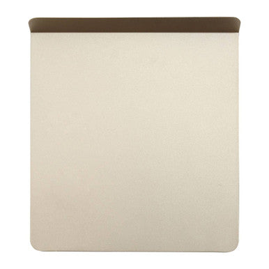 Cream-colored silicone scratch baking sheet with dark brown border perfect for all your baking needs
