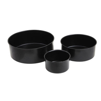 Set of three black round cake tins in varying sizes perfect for baking round cakes from scratch