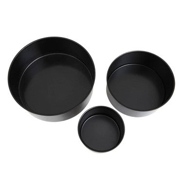 Set of three black non-stick round cake tins in different sizes perfect for baking round cakes from scratch