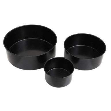 Set of three black non-stick round cake tins in varying sizes perfect for baking round cakes from scratch
