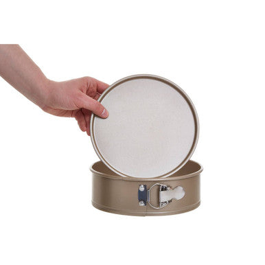 Gold-colored from scratch small cake pan with removable bottom and silver clasp small cake pan for easy release
