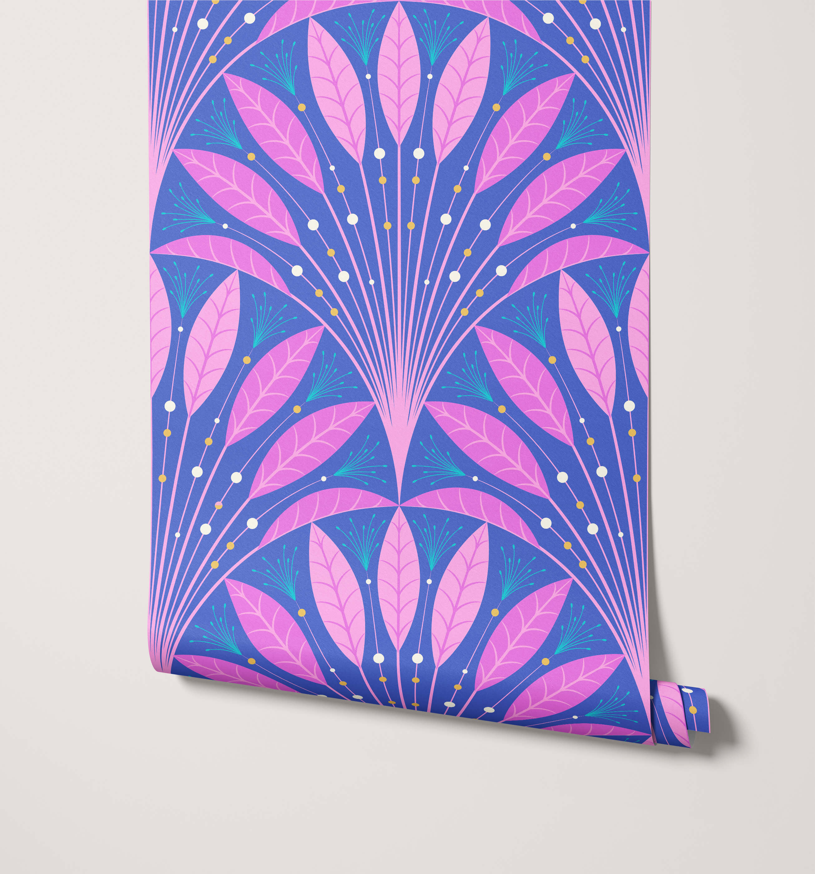 A roll of frond art deco wallpaper with pink and blue leaf patterns and gold dot accents in a symmetrical design