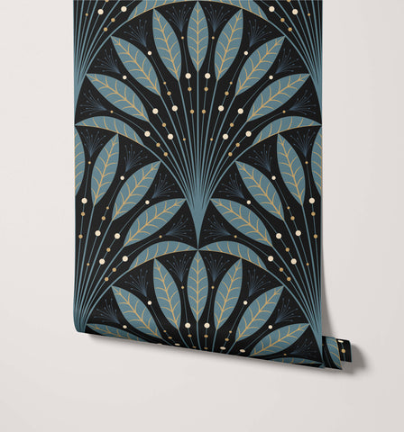 A roll of dark blue and gold art deco wallpaper with stylized leaf motifs called frond deco wallpaper