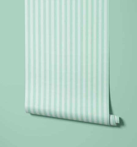 A roll of froyo mint green and white vertically striped wallpaper perfect for fresh stylish wall decor