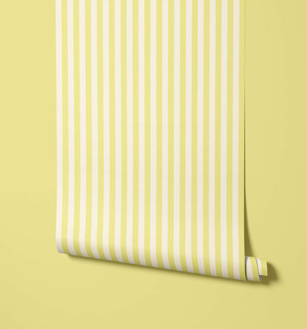 A roll of froyo striped wallpaper with pale yellow and white vertical stripes for stylish wall decor