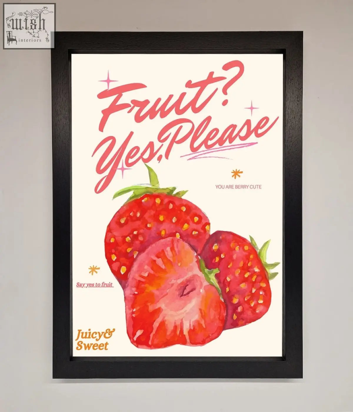 A framed poster featuring vibrant red strawberries with pink cursive text fruit yes please on a white background