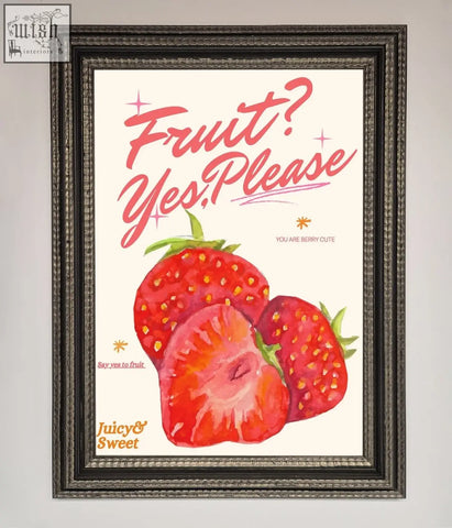 A framed poster with vibrant red strawberries and pink cursive text fruit yes please on cream background