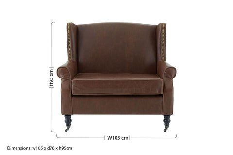 Fulham brown leather effect wing armchair with brass nailhead trim and dark wooden legs for stylish seating