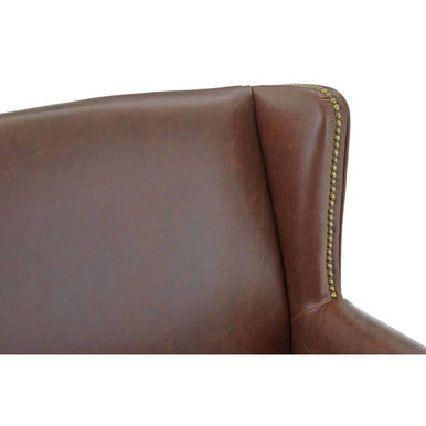 Fulham brown leather effect wing armchair with gold-toned nailhead trim and brown leather upholstery