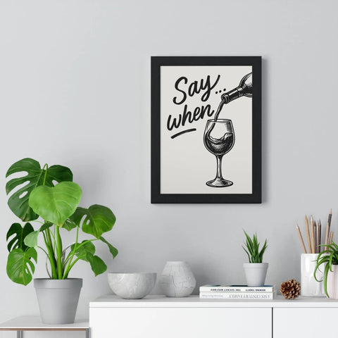 Black-framed wine poster with a monochrome wine pouring illustration and say when text perfect for kitchen and bar wall art