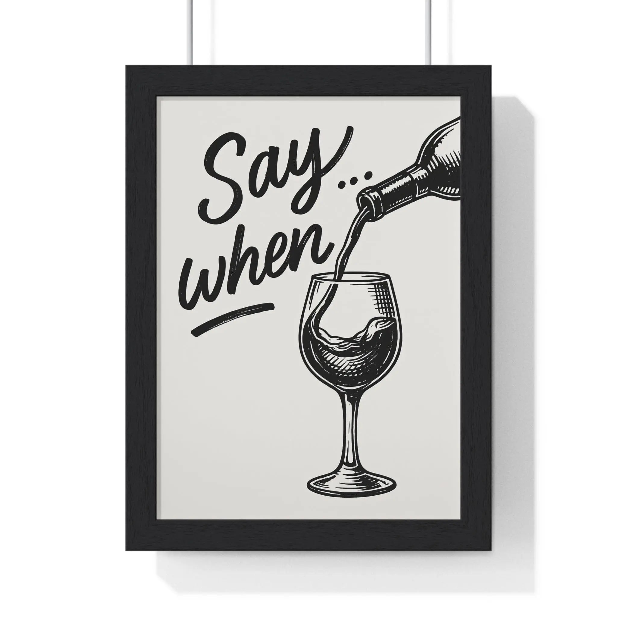 Black-framed wine poster with monochrome illustration of wine pouring and say when text for kitchen and bar wall art