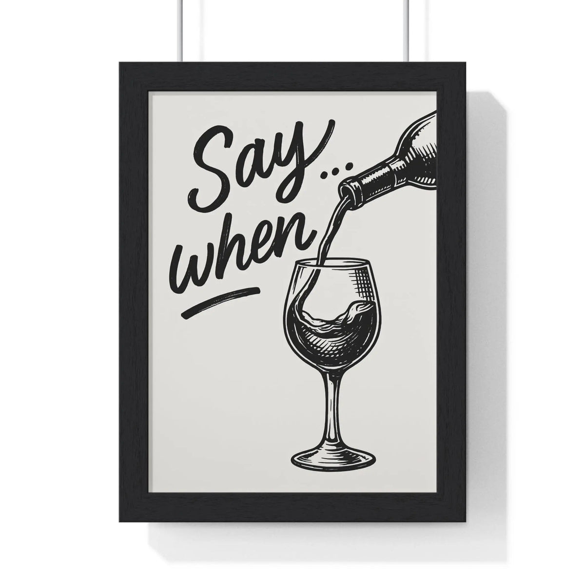 Black-framed wine poster with monochrome illustration of wine pouring and say when text for kitchen and bar wall art