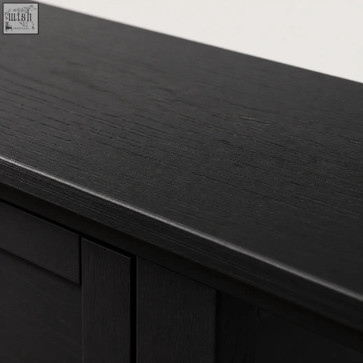 Black wooden console table with smooth matte finish grain texture and ring handles perfect for narrow spaces
