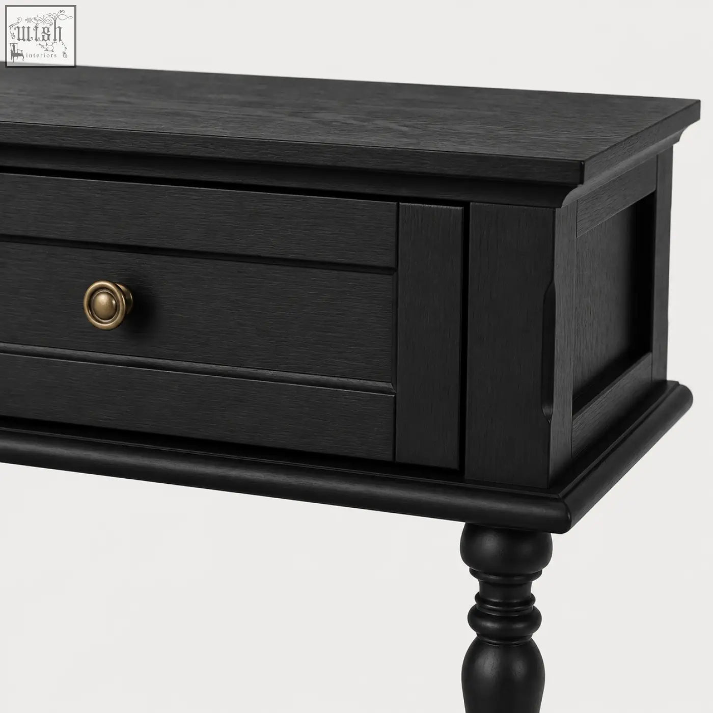 Black wooden console table with single drawer and brass knob designed for narrow spaces with full-width lower shelf