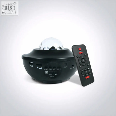 Black star projector with clear crystal dome and matching remote control perfect for home decor gadgets 61136
