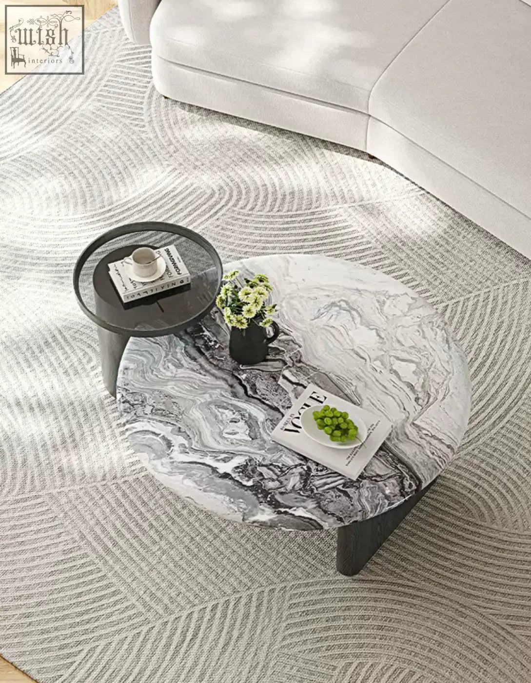 Galatea round nesting marble coffee table with a black and white marble top and sleek dark metal legs coffee table