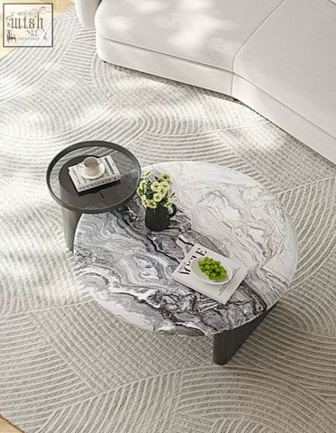 Galatea round nesting marble coffee table with a black and white marble top and sleek dark metal legs coffee table