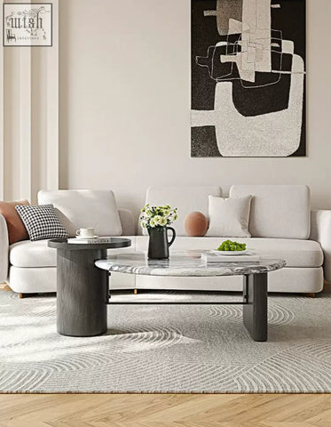 Modern galatea round nesting marble coffee table with oval white marble top and dark metal legs for living room