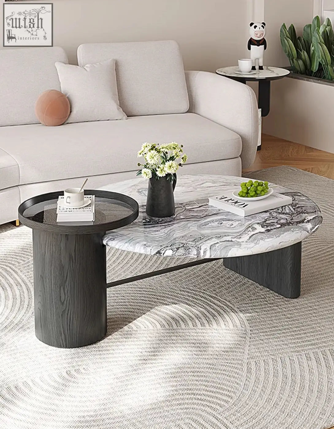 Modern oval galatea coffee table with gray white marble top and dark wood legs is a stylish marble coffee table