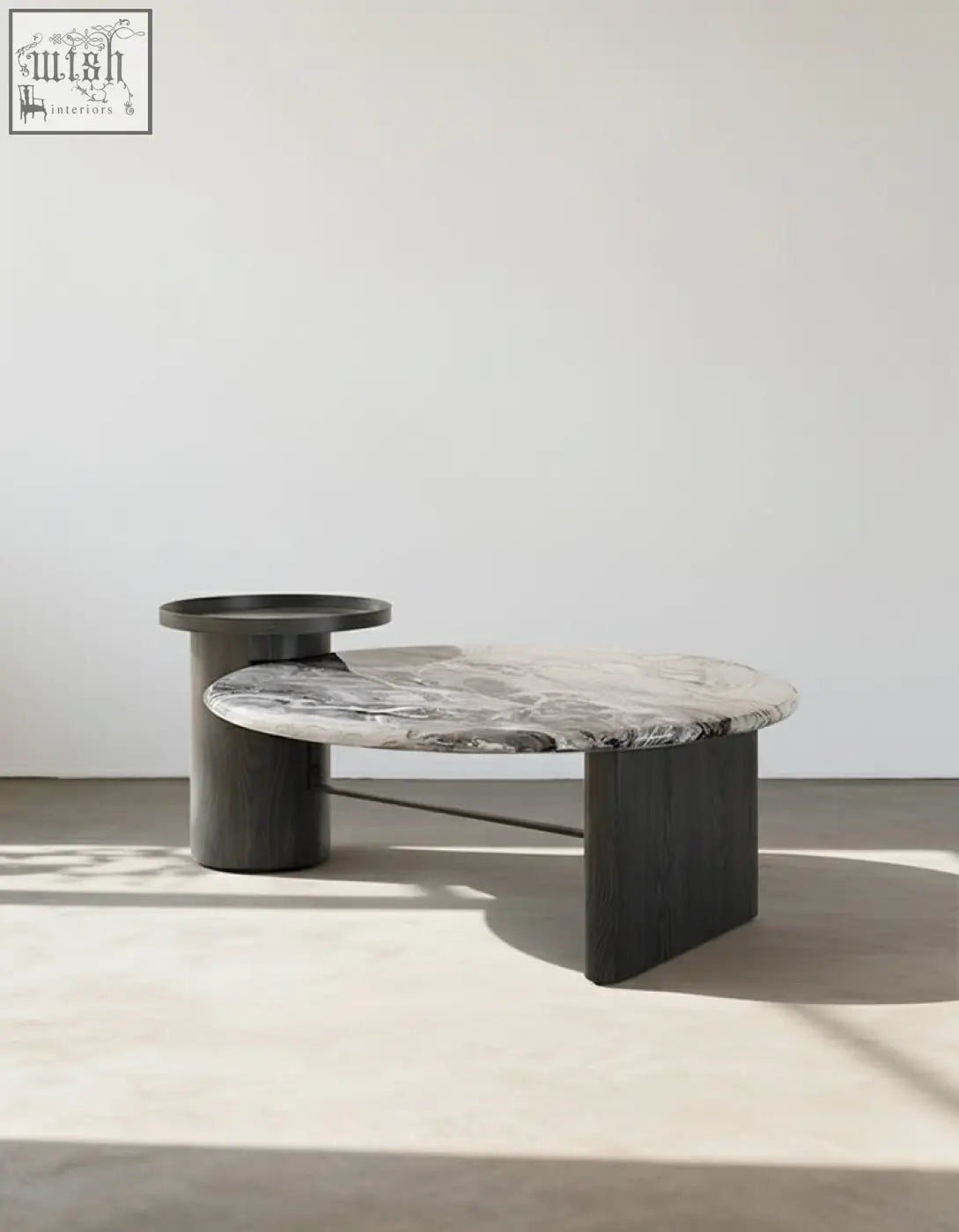 Galatea round nesting marble coffee table with a sleek gray and white marble top and dark matte wood legs
