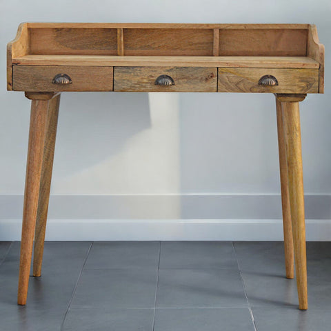 Light brown wooden gallery back shell writing desk with three drawers and shell shaped metal handles
