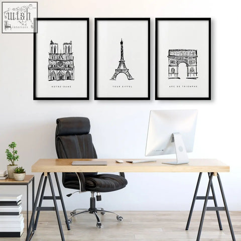 Black-framed minimalist line art paris landmarks wall art prints featuring notre dame eiffel tower and arc de triomphe above desk