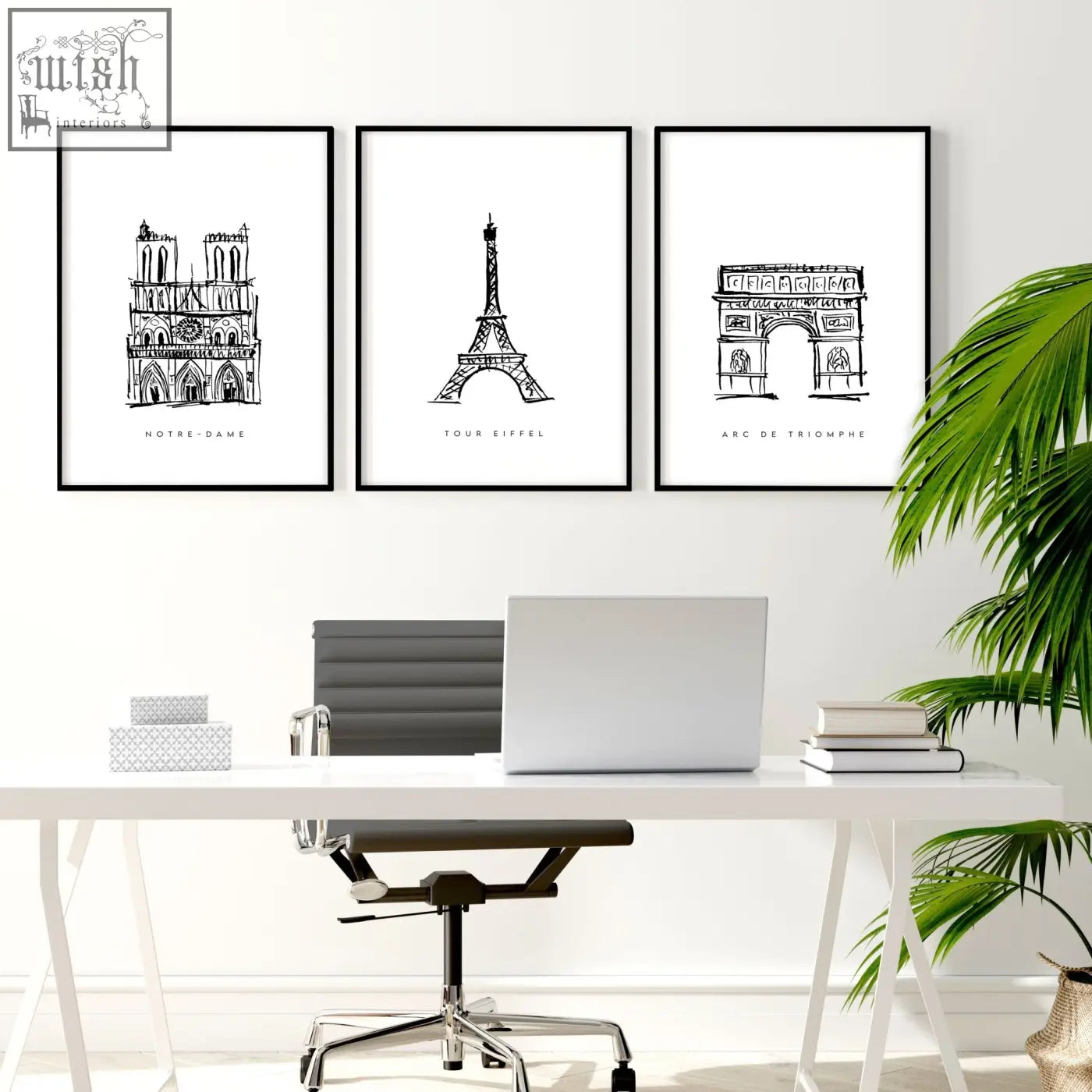 Three black-framed minimalist line art prints of paris landmarks wall art hang above a white desk for gallery wall framing
