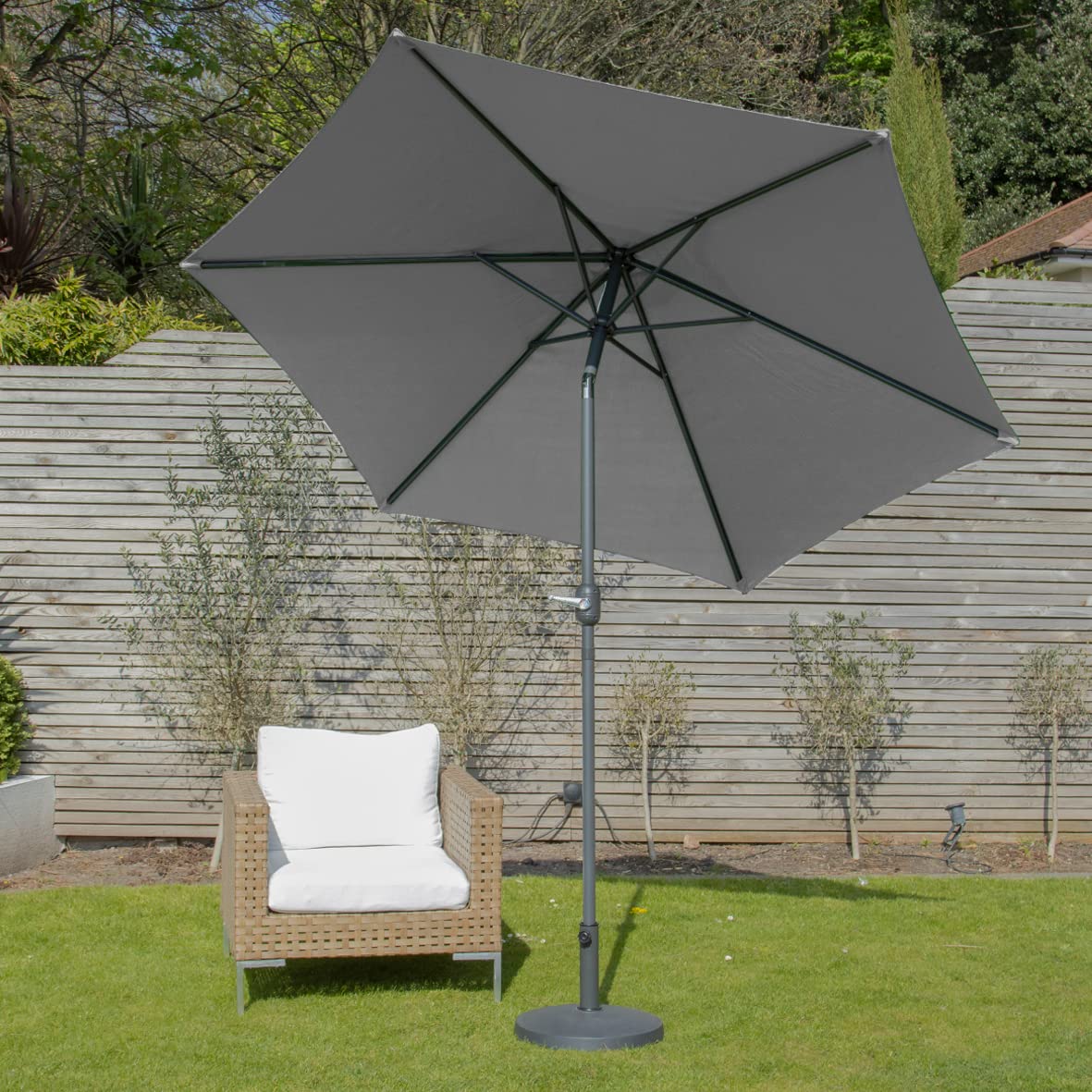 Grey garden parasol with crank mechanism steel ribs and durable polyester material on circular base