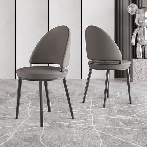 Modern grey upholstered gareth dining chair with sleek black metal legs perfect for stylish dining spaces