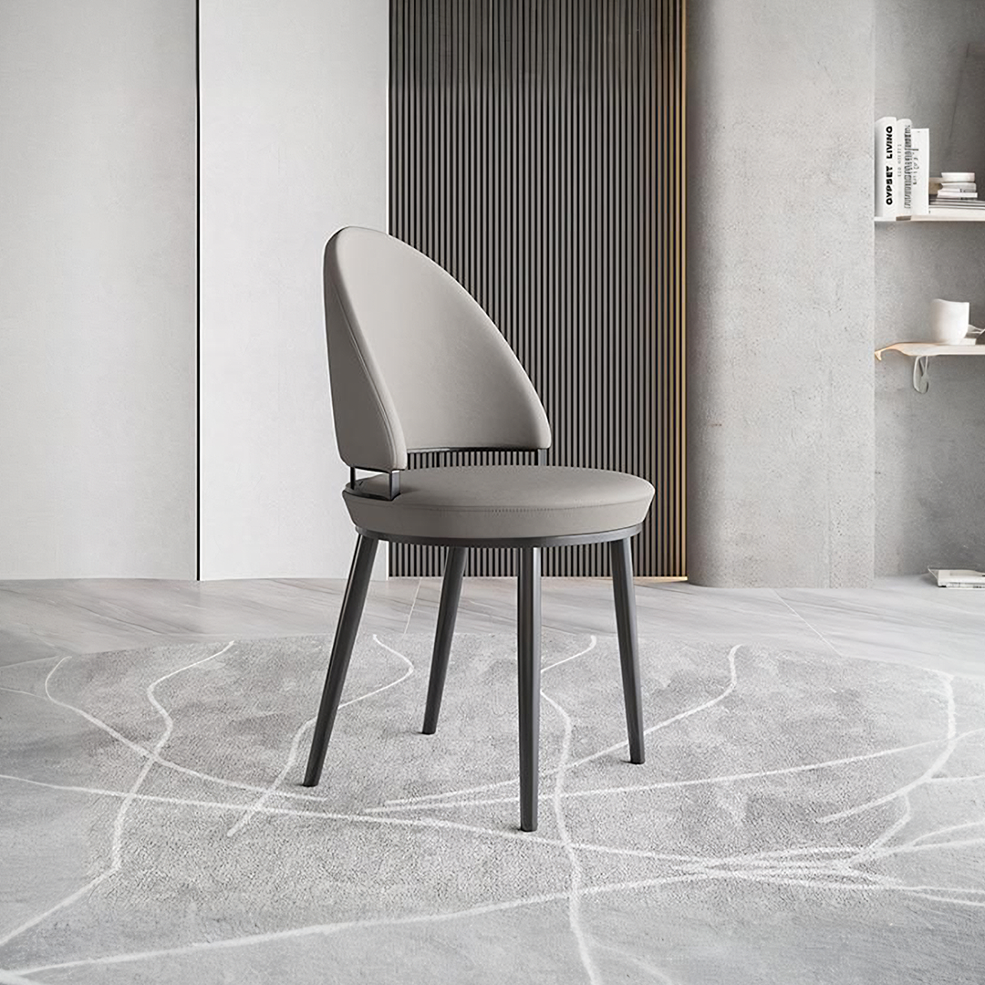 Modern gray upholstered gareth dining chair with sleek black metal legs perfect for stylish dining spaces