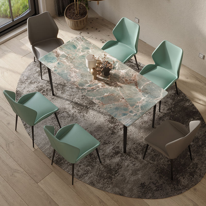 Modern gareth dining table with teal and white marble top and carbon steel frame surrounded by six chairs