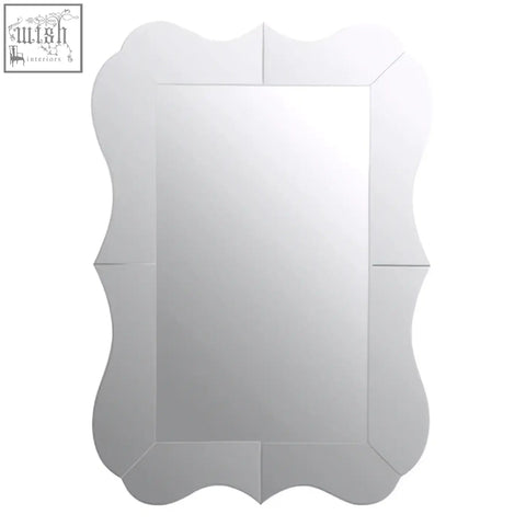 Silver-framed gavri wall mirror with scalloped edge design perfect as an elegant wall mirror centerpiece