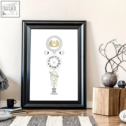 Black-framed gemini zodiac art print with gold celestial symbols and astrological glyphs on white wall art print