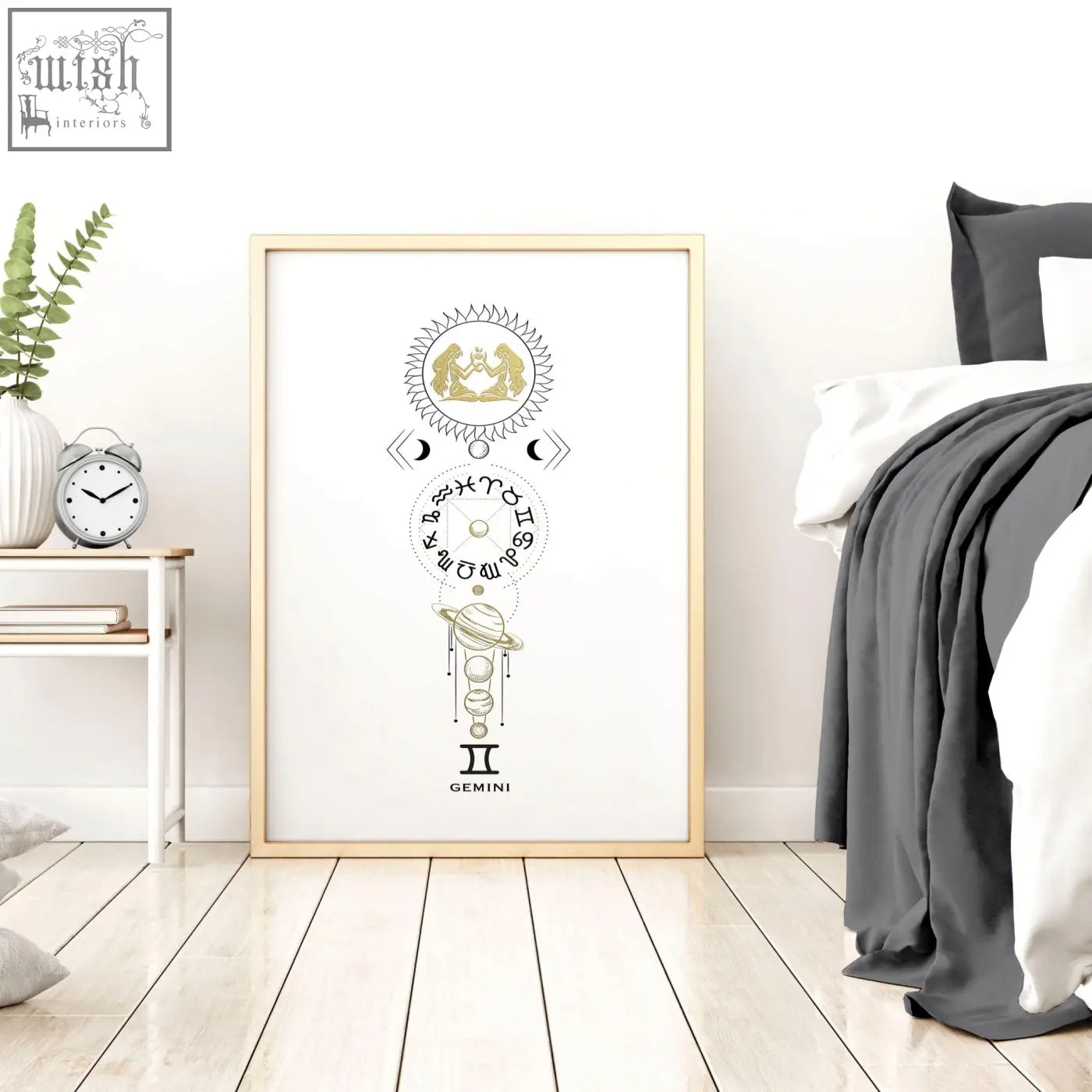 Minimalist gold and black gemini astrological design wall art print in a framed poster on a white background