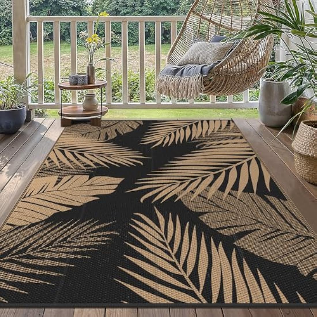Black and gold palm leaf patterned genimo extra large waterproof outdoor rug perfect for garden patio or backyard