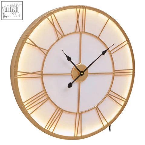 Genova small gold and white led wall clock with gold frame and illuminated roman numerals in minimalist design