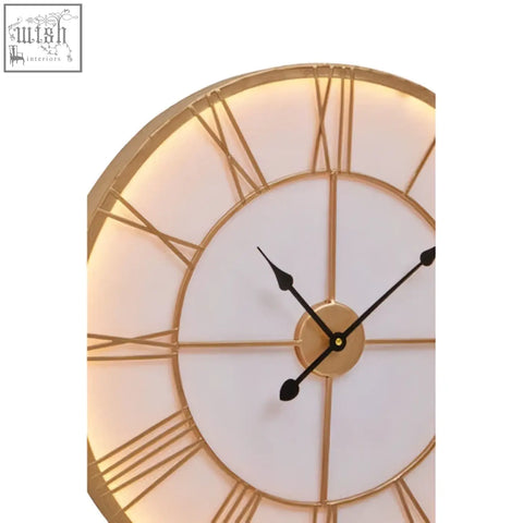 Genova small gold and white led wall clock with gold frame roman numerals and softly glowing white led face