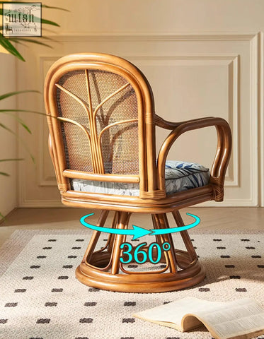 Gentry swivel rattan lounge chair with natural wood finish woven cane seat and back on 360-degree swivel base shipping cost info available