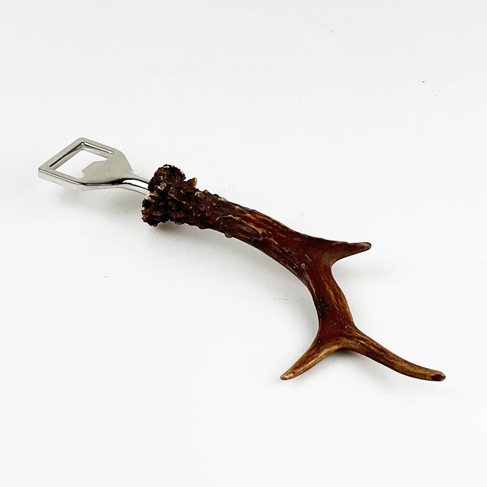 Genuine roe antler bottle opener with polished silver metal cap and natural brown textured roe antler handle