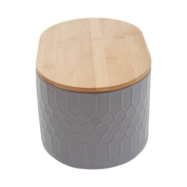 Gray ceramic geome grey bread bin with light wood lid and geometric embossed pattern in stoneware material