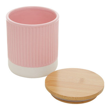 Pink ceramic geome pink 550ml storage canister with vertical ridges white base and bamboo lid for kitchen use
