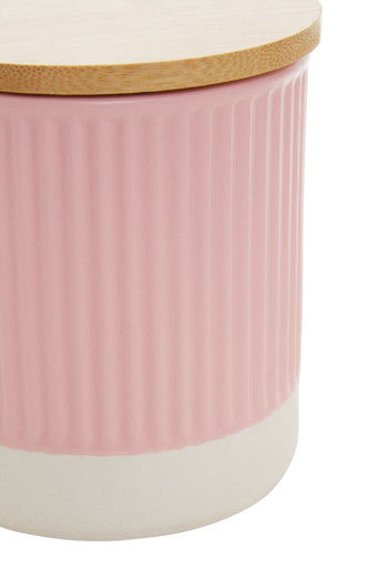 Pink ribbed ceramic geome pink 550ml storage canister with a light wood lid perfect for kitchen organization