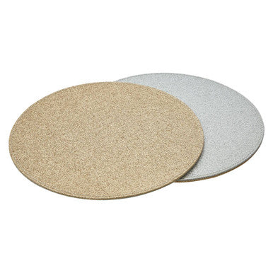 Two circular sanding discs showing the back side of geome reversible gold and silver glitter placemats textured surface