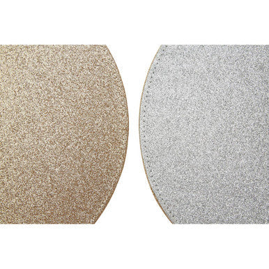 Two circular glitter placemats in reversible gold and silver glitter placemats perfect for festive table settings