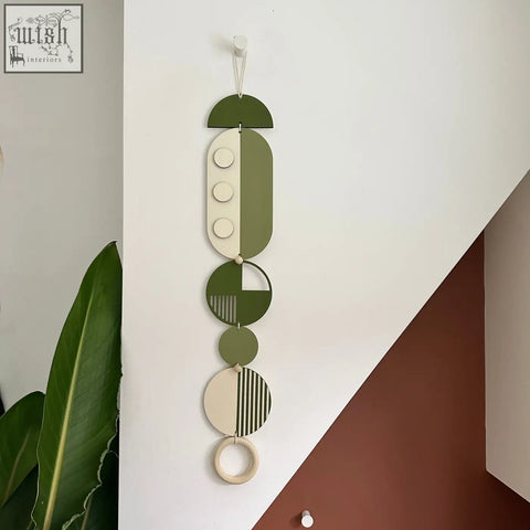 Olive and cream geometric modern wall art with circular and oval shapes made from sustainable plywood for minimal home decor